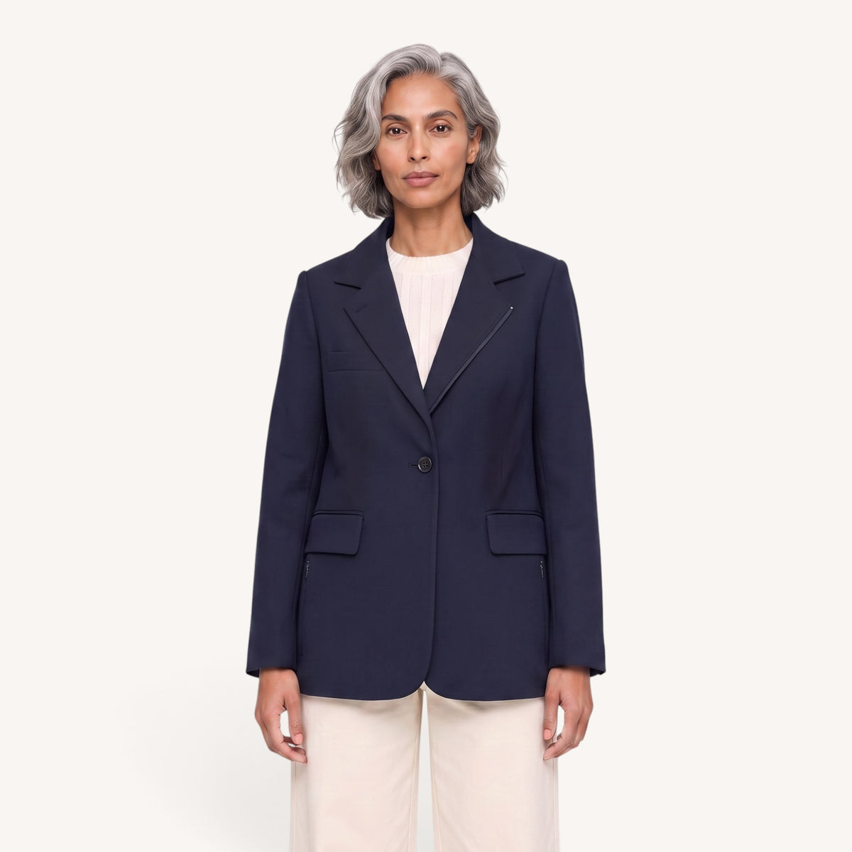 Woman wearing the Arno Jacket in navy